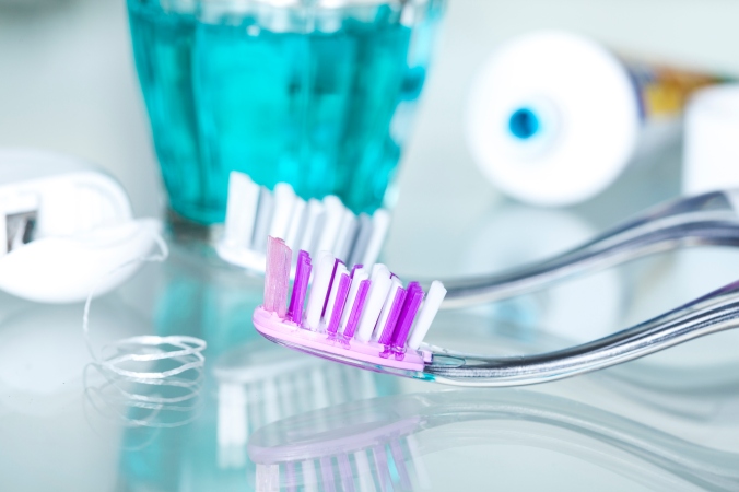 Toothbrush and Floss for Dental Implant Care